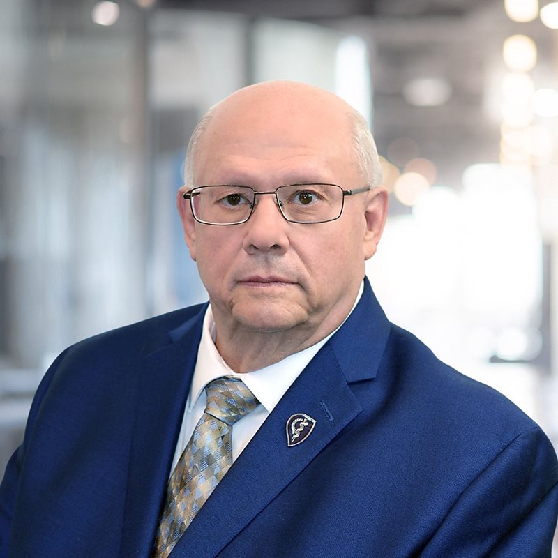 Dr. Rick Schooler